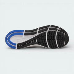 View of the durable rubber outsole, showcasing the traction pattern and the lateral crash rail designed for a smooth transition.