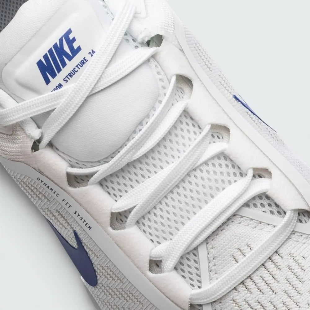 Close-up of the front, showing the fine detail of the engineered white mesh and the sturdy eyelets for a locked-in fit.