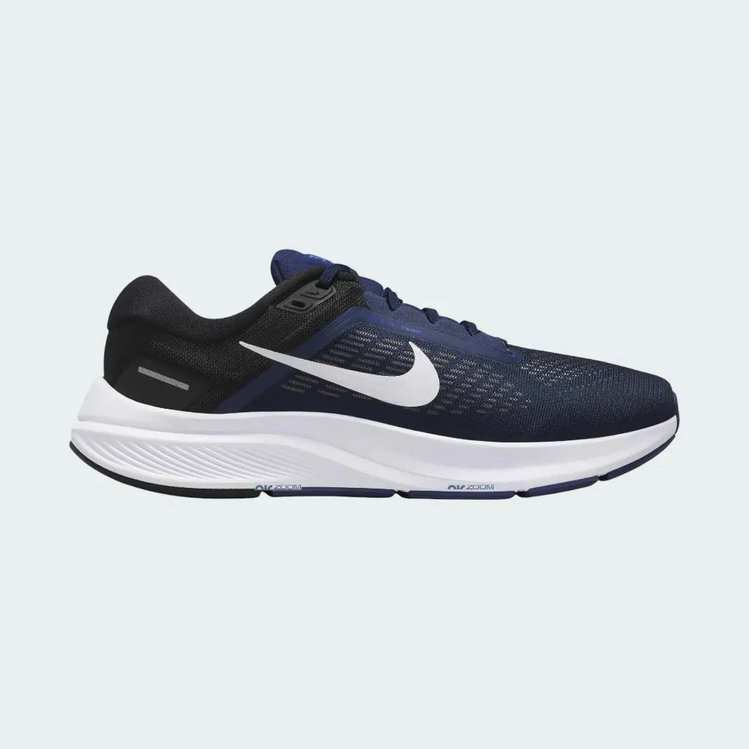 Nike Air Zoom Structure 24 Men's running shoes in midnight navy blue, side profile showing engineered mesh upper, cushioned midsole, and Nike Swoosh.