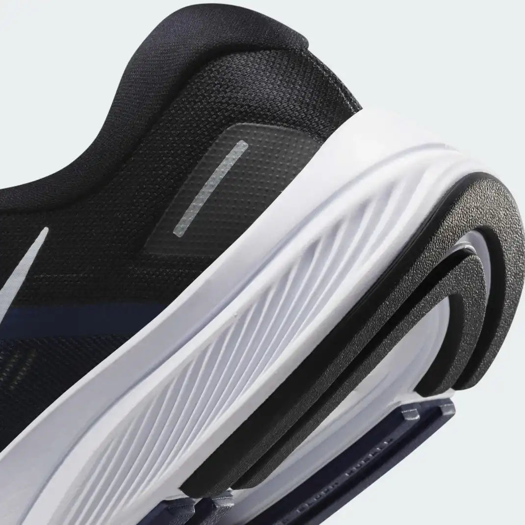Detailed zoom on the outsole and midsole of the Nike Air Zoom Structure 24 Men's navy running shoes, highlighting the Zoom Air cushioning and durable rubber outsole.