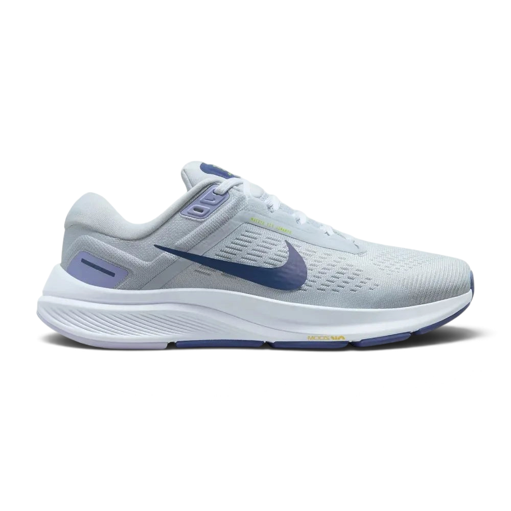 Side profile of the Nike Air Zoom Structure 24 Women's trainers in Pure Platinum, showing the Diffused Blue Swoosh and the supportive foam midsole.