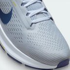 Close-up of the front, showing the fine detail of the engineered Pure Platinum mesh and the sturdy eyelets for a locked-in fit.