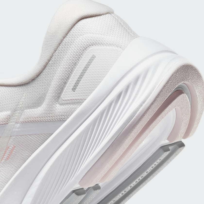 Close-up from heel underside showing Zoom Air sole and durable outsole of Nike Air Zoom Structure 24 Women's trainers
