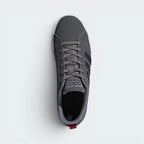 Focuses on the locked-in lacing system and the professional adidas branding on the tongue.