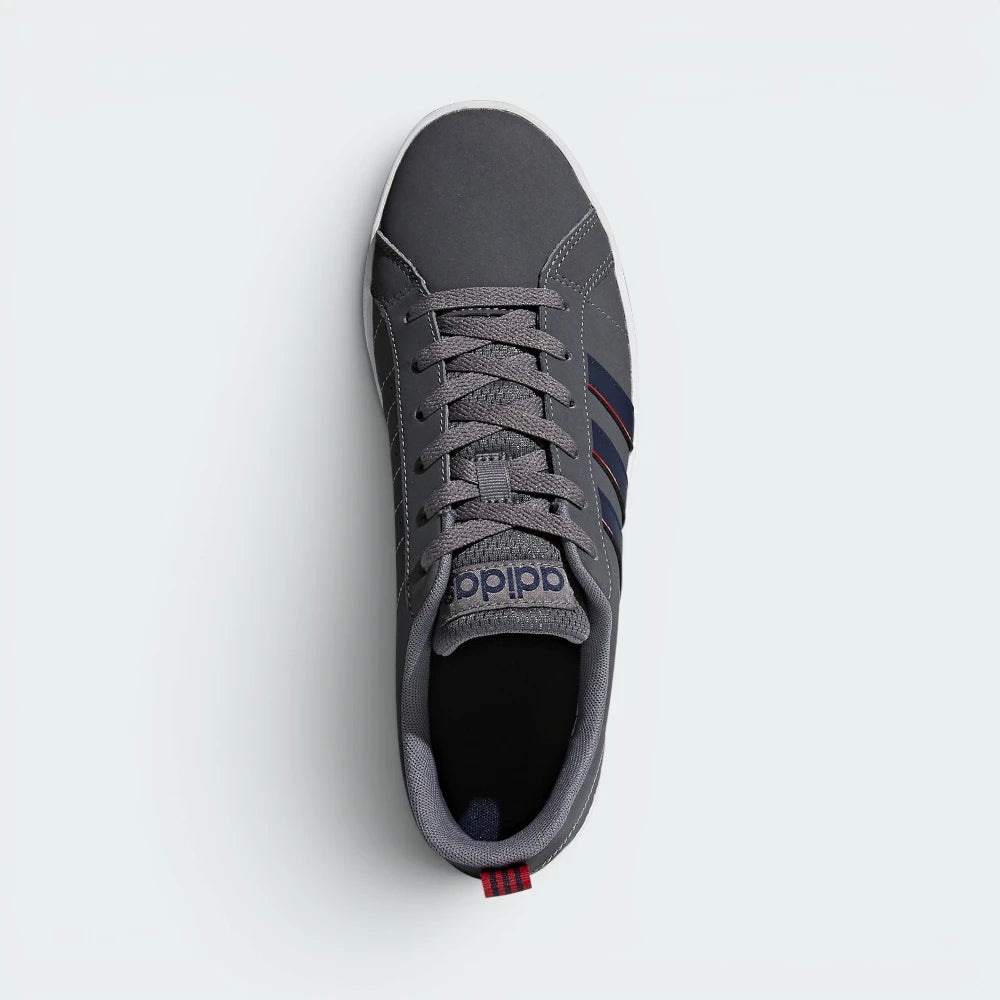 Focuses on the locked-in lacing system and the professional adidas branding on the tongue.