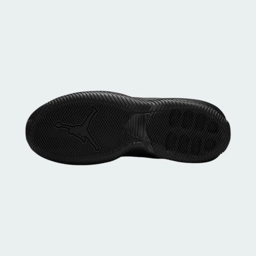 View of the outsole of the Jordan Stay Loyal men's black trainers, showing the durable rubber sole and multi-directional traction pattern.