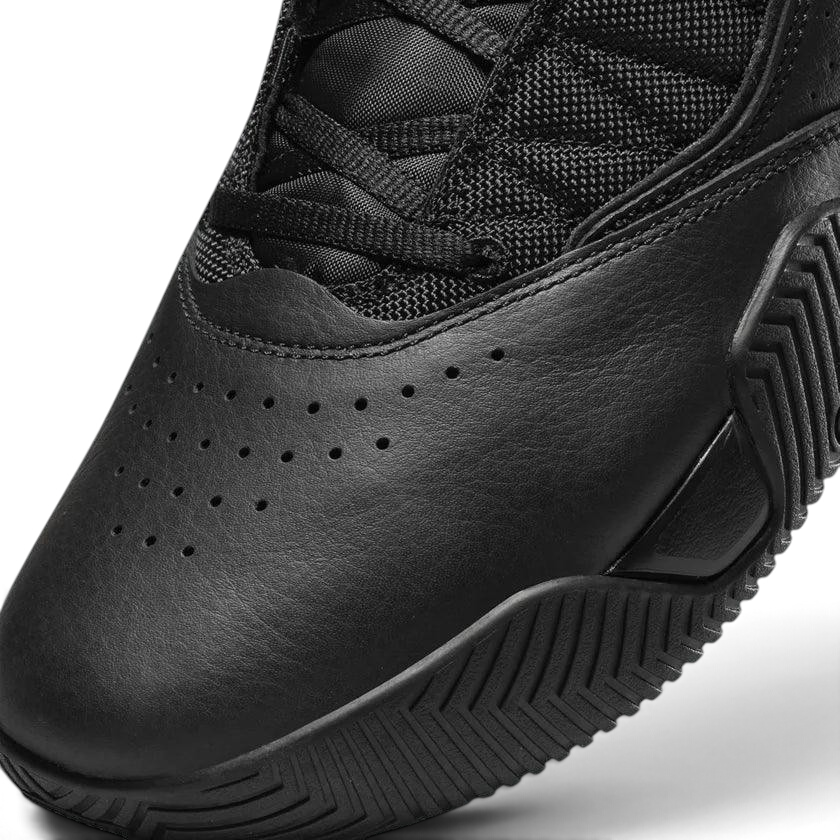 Close-up zoom on the front of the Jordan Stay Loyal men's trainers, showing the perforated toe box, lacing system, and textured upper.