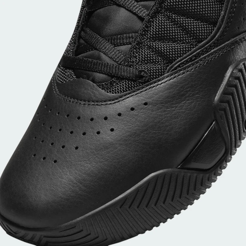 Close-up zoom on the front of the Jordan Stay Loyal men's trainers, showing the perforated toe box, lacing system, and textured upper.