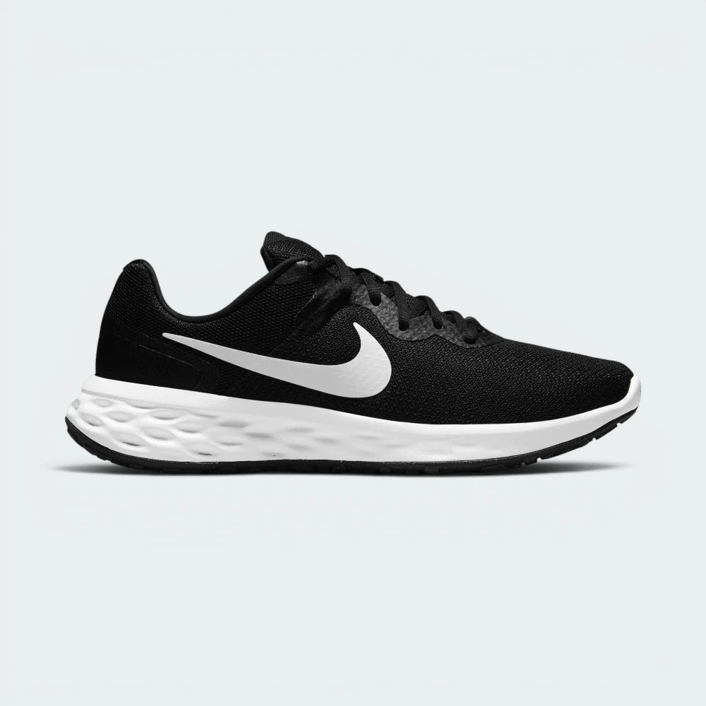 Highlights the high-velocity sweep of the contrasting white Nike Swoosh, showing the professional, multi-textured grey and black mesh upper, the seamless synthetic overlays reinforcing the laces, and the clean white foam midsole wall.