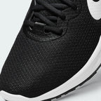 Details the premium precision of the seamless overlays wrapping the front toe cap to defend against debris, showing off the breathable perforations in the mesh up close.