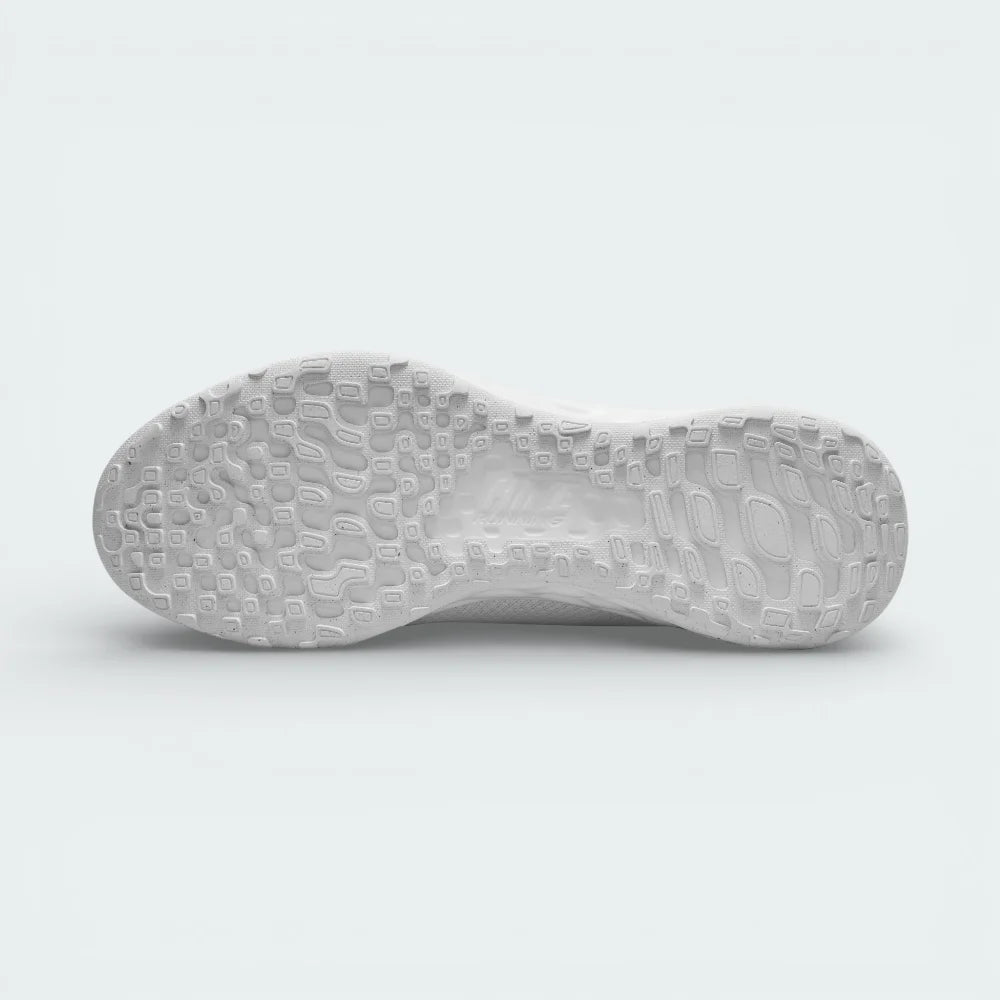 Detailed view of the white rubber outsole, showing the generative traction pattern and flex grooves designed for a natural stride.