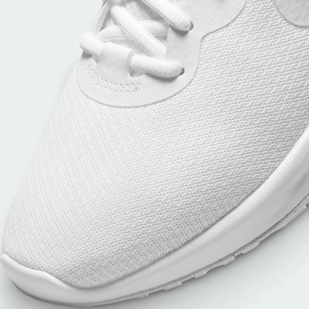 Close-up of the front of the shoe, showing the clean white laces and the reinforced mesh material at the toe.