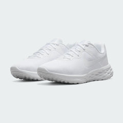 Angled view of two Nike Revolution 6 Women's white training shoes, side by side, showcasing their versatile design and cushioned profile.