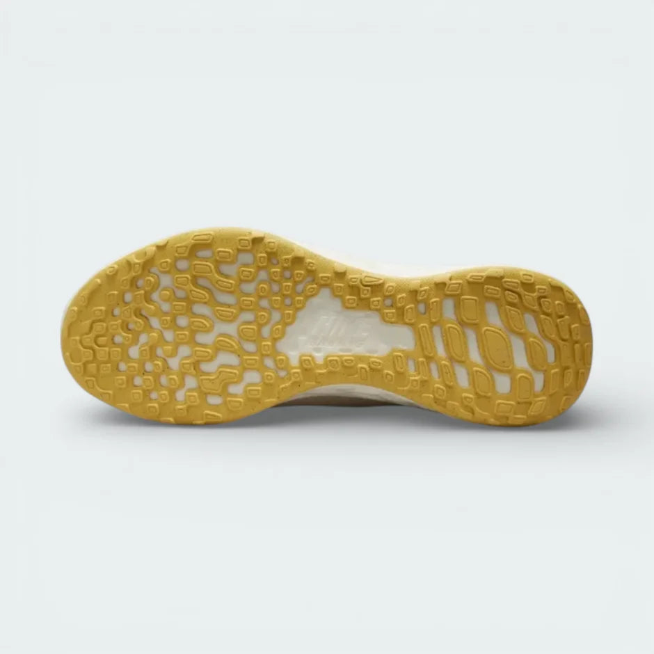 View of the Topaz Gold rubber outsole, showcasing the computer-generated traction pattern and flex grooves.
