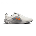 Nike Quest 5 Men's running shoe in sail (off-white) with thunder blue and total orange accents, side profile showing breathable mesh upper and contoured sole.
