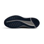View of the outsole of the Nike Quest 5 Men's running shoes, showing the durable rubber tread pattern for road traction.