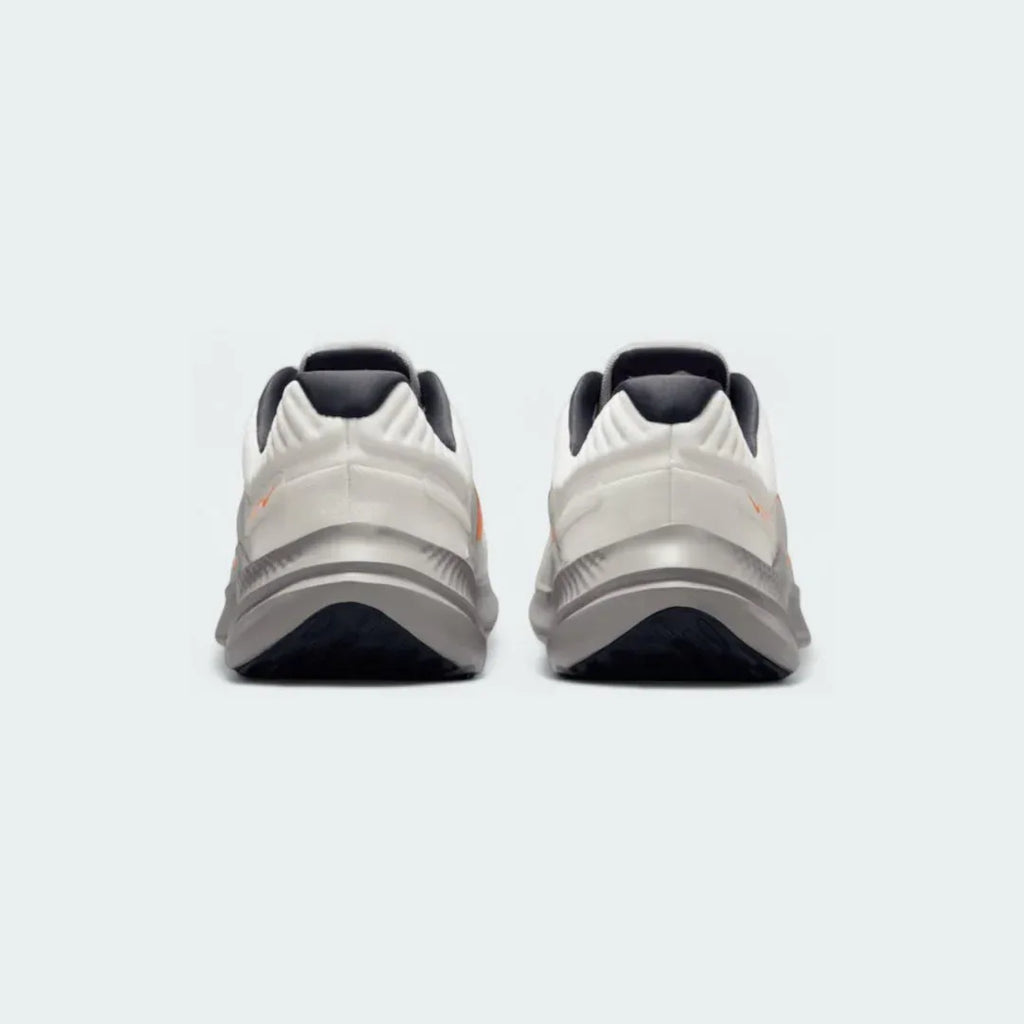 Rear view of the Nike Quest 5 Men's running shoes, focusing on the supportive heel collar and subtle branding.