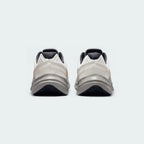 Rear view of the Nike Quest 5 Men's running shoes, focusing on the supportive heel collar and subtle branding.