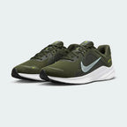 Nike Quest 5 Men's Green Running Shoes DD0204-300 angled view showing athletic silhouette and Swoosh logo