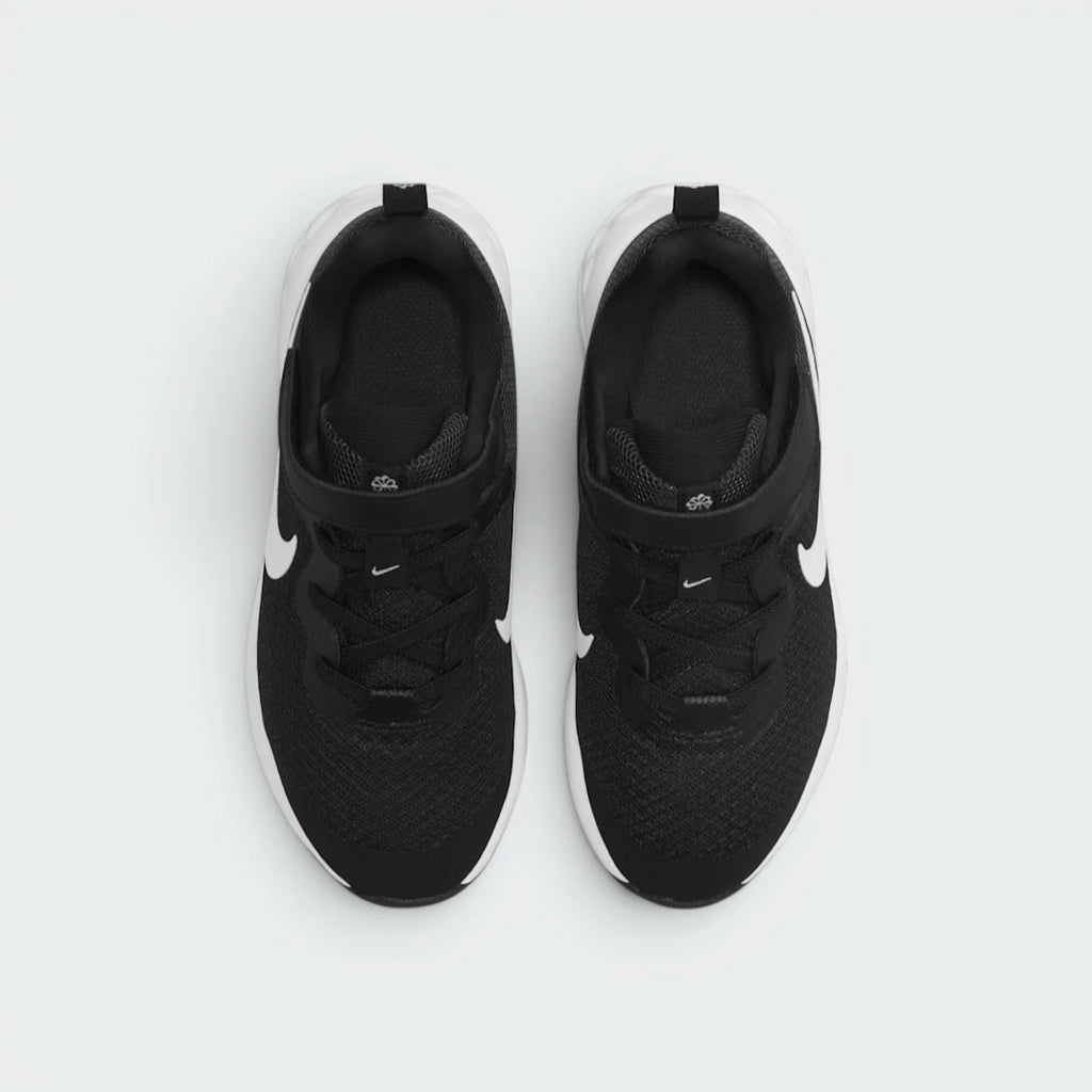 Focuses on the locked-in elastic lace layout, displaying the exact placement of the wide hook-and-loop strap crossing the mesh tongue.