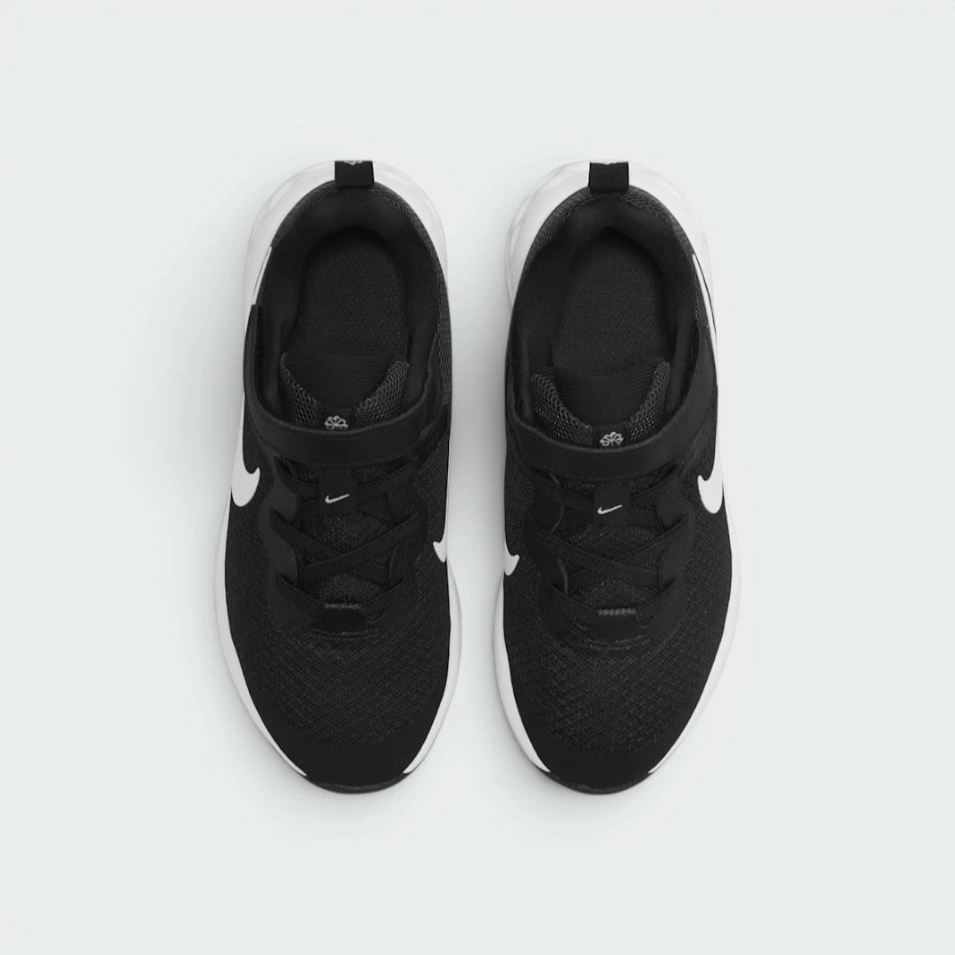 Focuses on the locked-in elastic lace layout, displaying the exact placement of the wide hook-and-loop strap crossing the mesh tongue.
