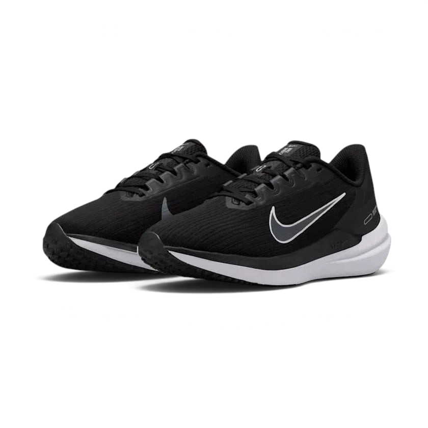 Nike Air Winflo 9 Women's Black Running Shoes DD8686-001 angled view highlighting streamlined silhouette and responsive cushioning design
