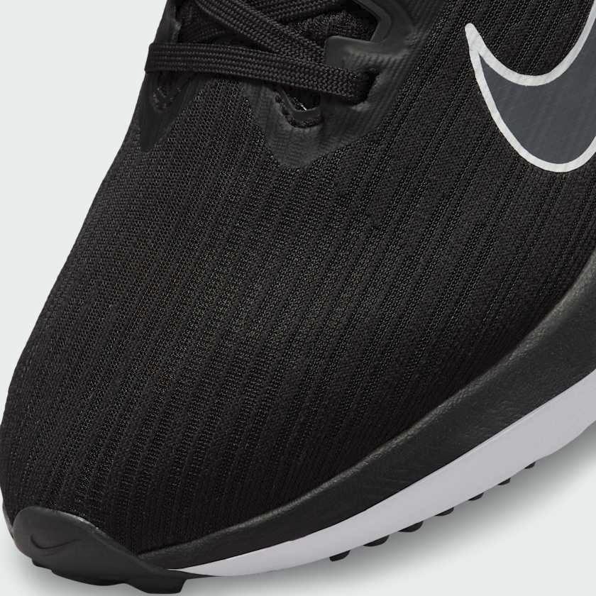 Close-up of Nike Air Winflo 9 Women's Black Running Shoes DD8686-001 mesh texture, laces, and tongue logo