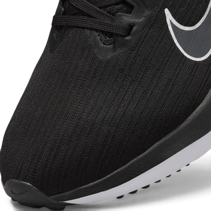 Close-up of Nike Air Winflo 9 Women's Black Running Shoes DD8686-001 mesh texture, laces, and tongue logo