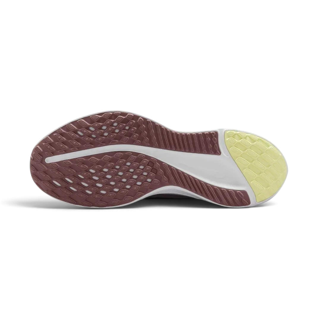 View of the outsole of the Nike Quest 5, showing the black rubber tread pattern designed for reliable road traction.