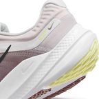 Detailed zoom on the side of the shoe, highlighting the soft foam midsole construction and the durable rubber edge of the outsole.