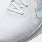 Close-up zoom on the front of the Nike Quest 5 Women's white running shoes, showing the mesh upper texture and integrated lacing system.