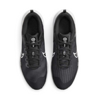 Top-down view of a pair of Nike Downshifter 12 Men's training shoes in black, highlighting their streamlined silhouette and lace-up closure.