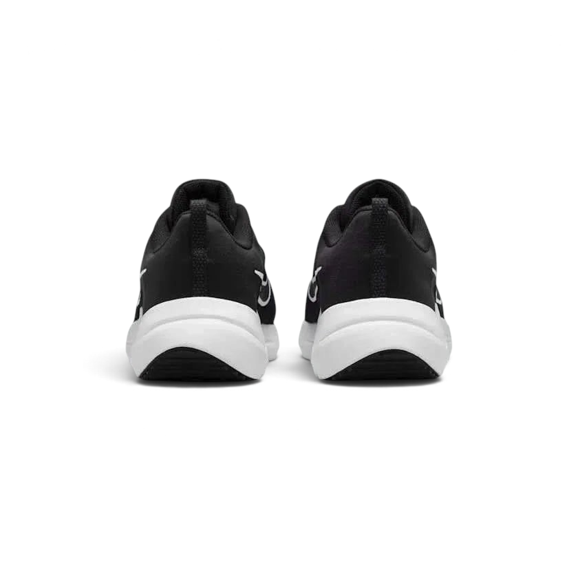 Rear view of the Nike Downshifter 12 Men's black training shoes, focusing on the structured heel and subtle branding.
