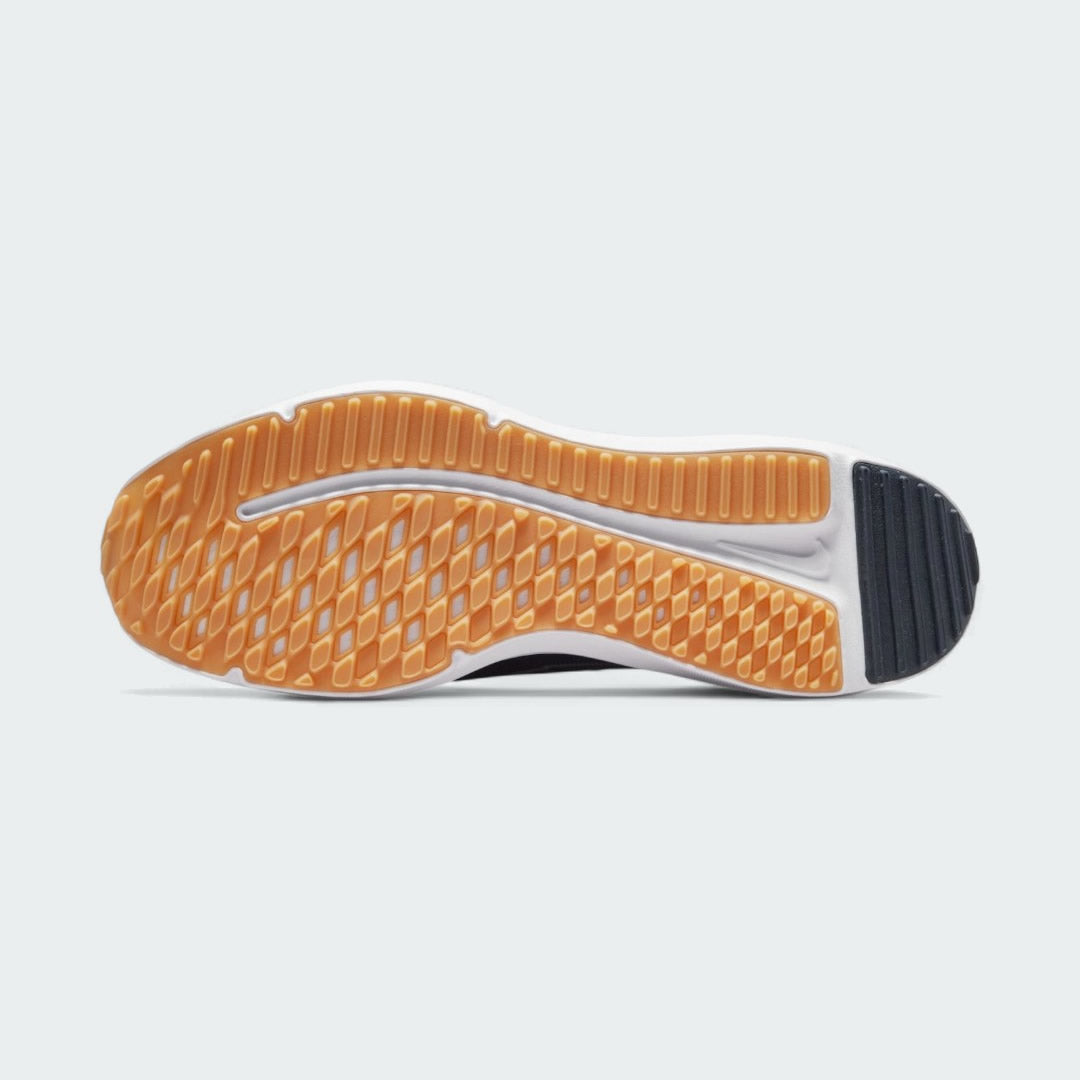 View of the outsole of the Nike Downshifter 12 Men's navy blue training shoes, showing the durable rubber tread pattern for multi-surface traction.