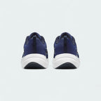 Rear view of the Nike Downshifter 12 Men's navy blue training shoes, focusing on the structured heel and subtle branding.