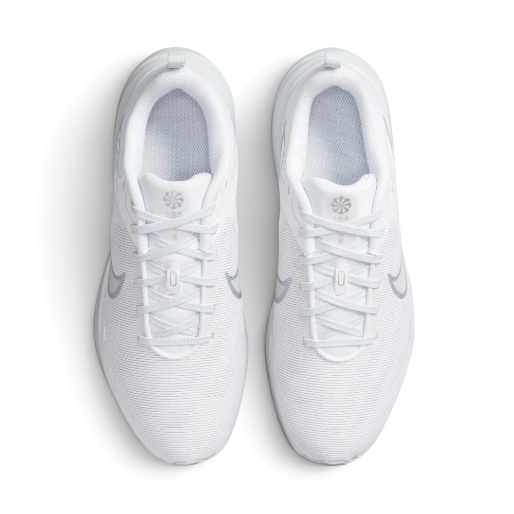 Focuses on the locked-in lace closure, the internal fitband components visible through the midfoot mesh, and the breathable texturing of the toe box.