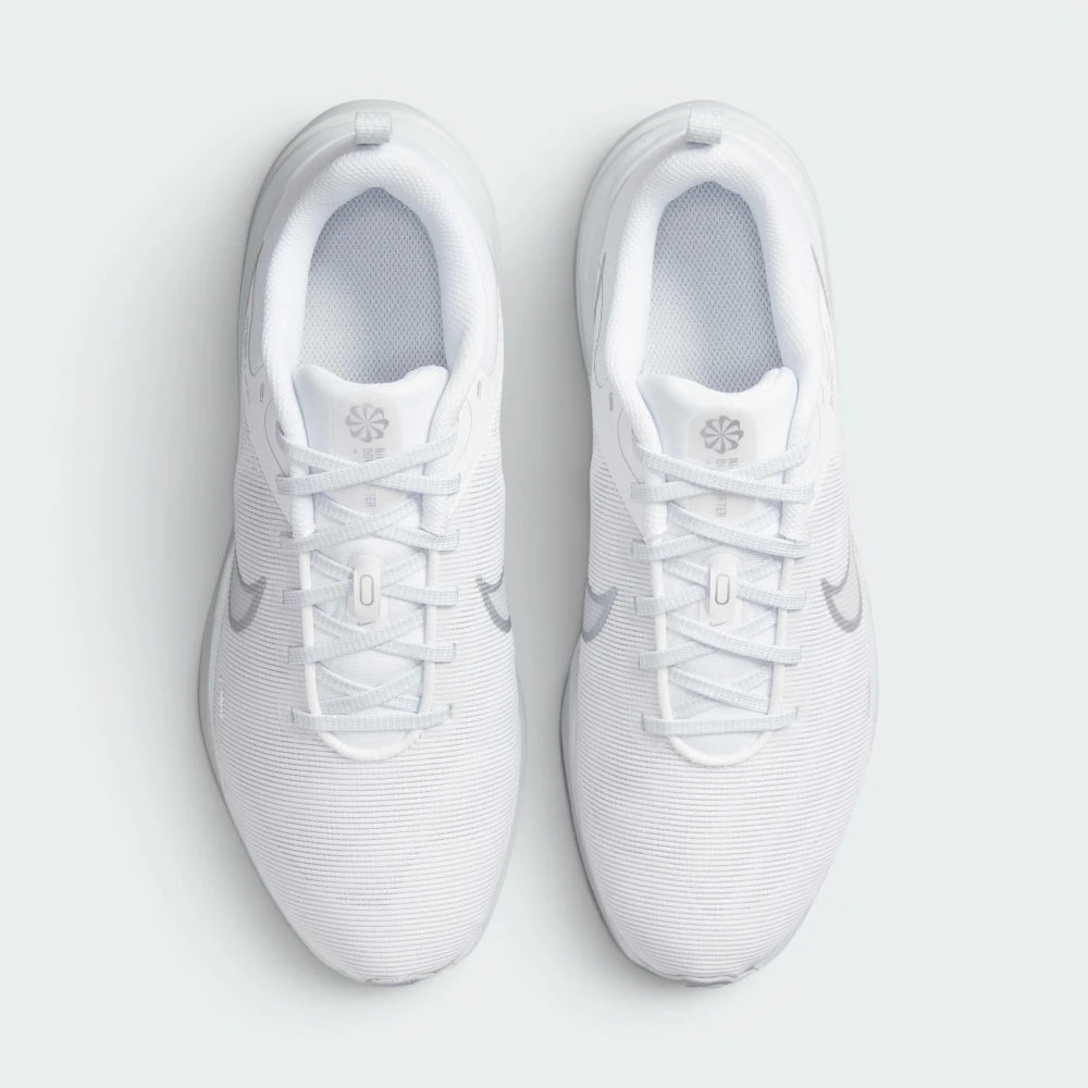 Focuses on the locked-in lace closure, the internal fitband components visible through the midfoot mesh, and the breathable texturing of the toe box.