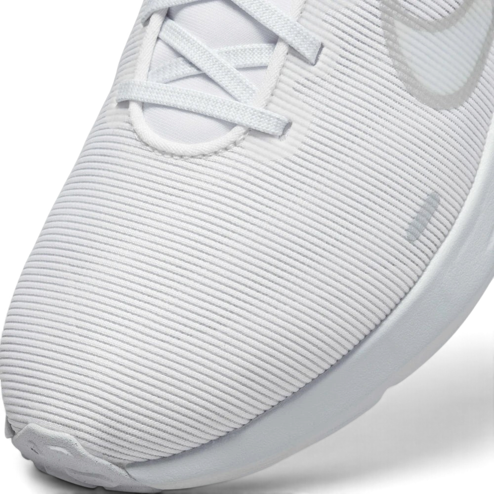 Details the high-definition micro-perforations across the forefoot cooling zones and the precision skin reinforcements over the eyelets.