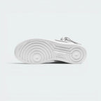Displays the legendary concentric pivot circle geometric traction pattern of the solid white rubber sole, engineered for unreal everyday multi-surface street grip.