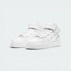 Emphasising the iconic, boxy retro basketball stance and the professional harmony of the triple-white panel arrangement.