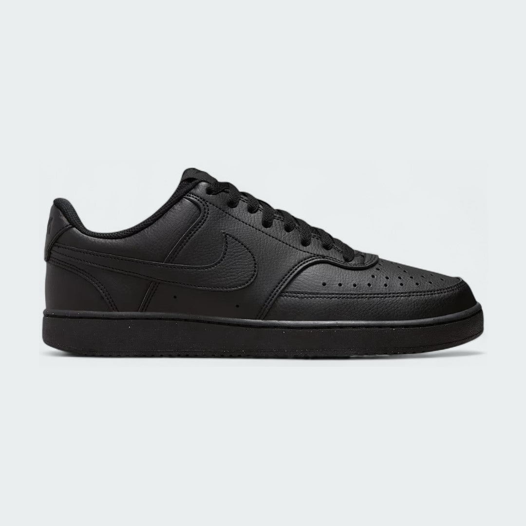 Nike Court Vision Lo Next Nature Men's trainers in all black, side profile showing classic basketball-inspired design, stitched overlays, and Nike Swoosh.