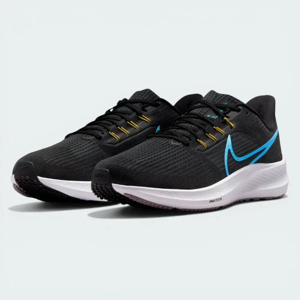 Three-quarter view of the shoes, emphasizing the sleek transition from the dark grey heel to the black forefoot.