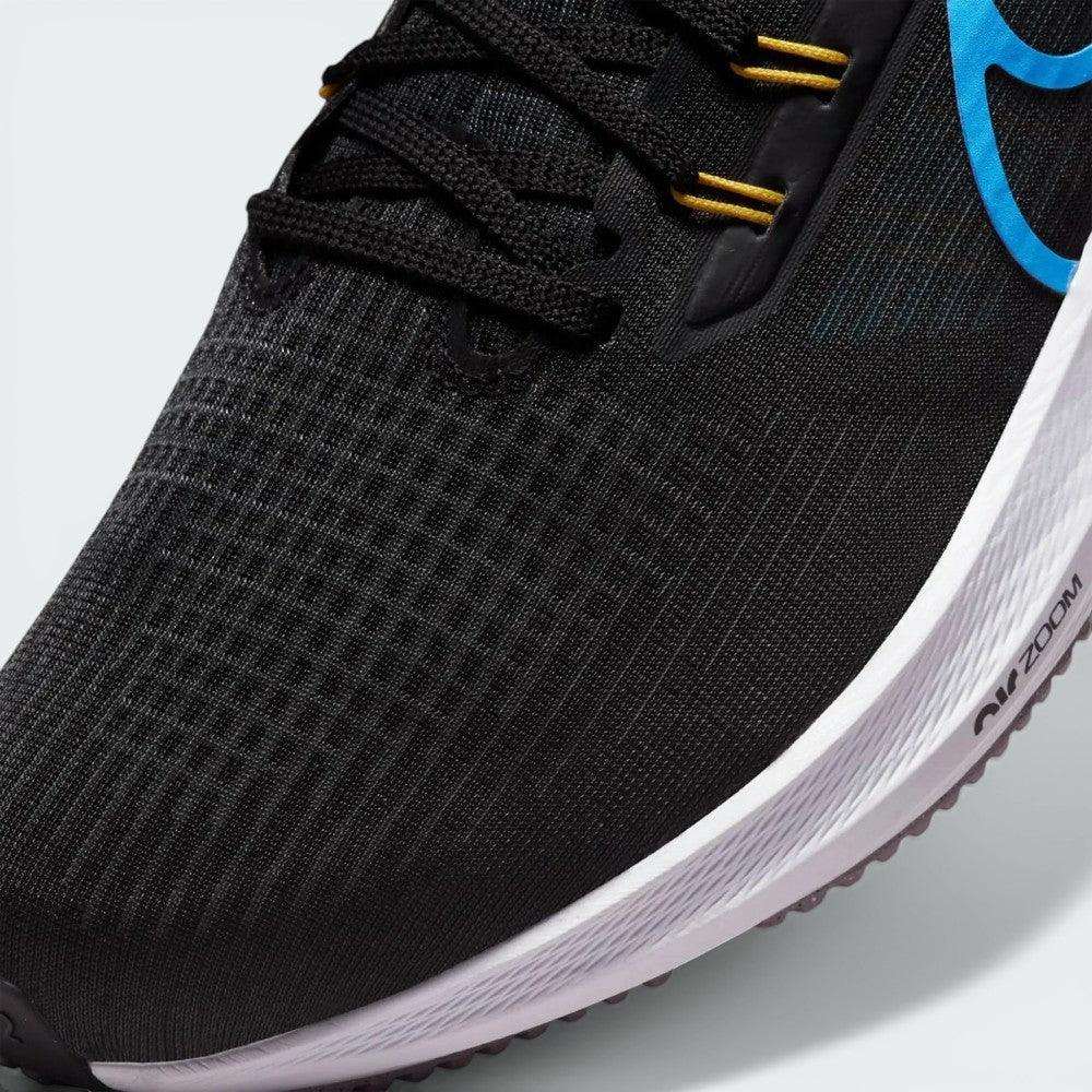 Zoom looking at the front of the shoes and laces, highlighting the breathable engineered mesh and Chlorine Blue eyelets.