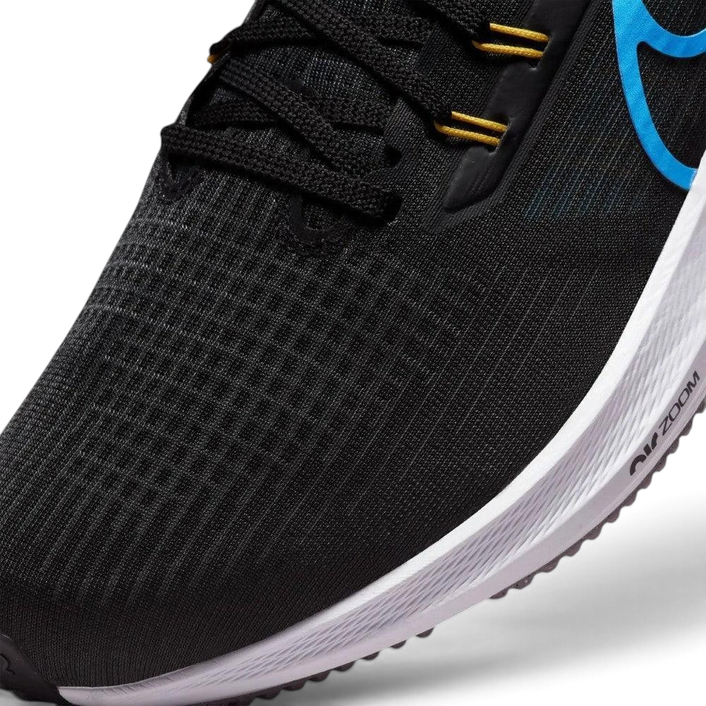 Zoom looking at the front of the shoes and laces, highlighting the breathable engineered mesh and Chlorine Blue eyelets.