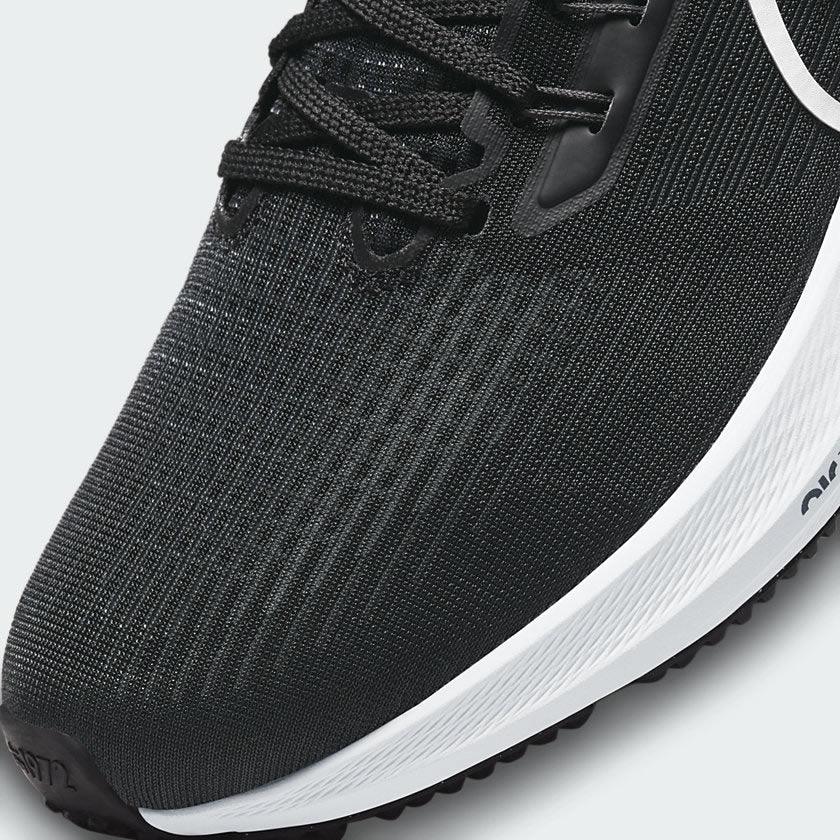 Close-up of the forefoot mesh and lacing, highlighting the precision stitching and the breathable fabric technology.