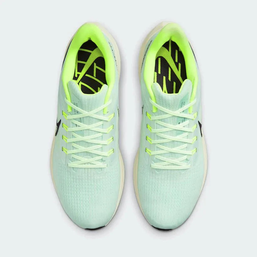 Top-down view of a pair of Nike Air Zoom Pegasus 39 Men's running trainers in green, highlighting their streamlined silhouette and lace-up closure.