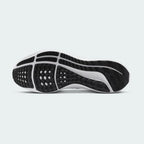 View of the outsole of the Nike Air Zoom Pegasus 39 Men's blue running trainers, showing the durable rubber waffle-inspired tread pattern for road traction.