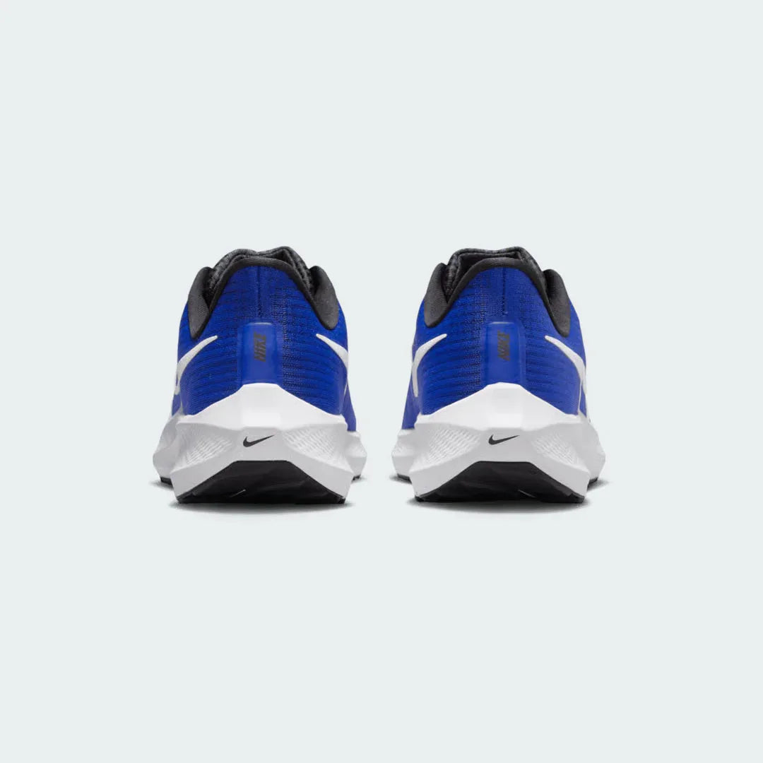 Rear view of the Nike Air Zoom Pegasus 39 Men's blue running trainers, focusing on the supportive heel collar and design for smooth transitions.