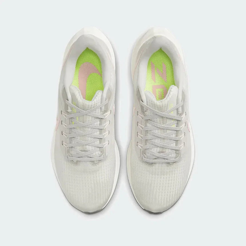 Top-down view of a pair of Nike Air Zoom Pegasus 39 Women's running trainers in grey, highlighting their streamlined silhouette and lace-up closure.