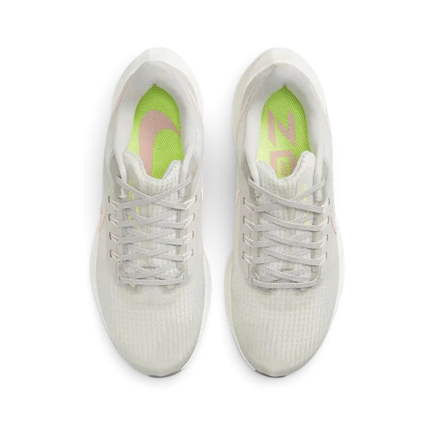 Top-down view of a pair of Nike Air Zoom Pegasus 39 Women's running trainers in grey, highlighting their streamlined silhouette and lace-up closure.